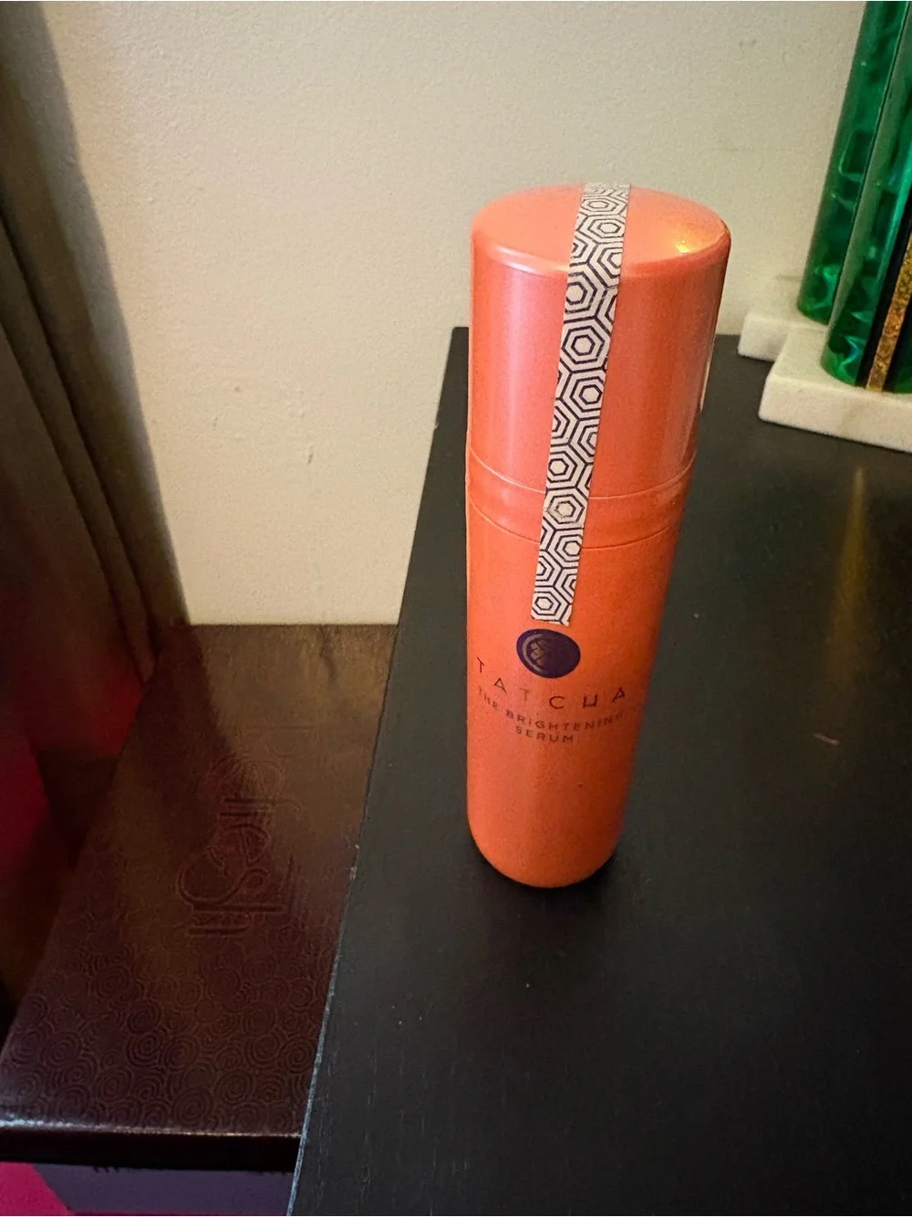 Tatcha Brightening Serum in Coral-Toned Bottle